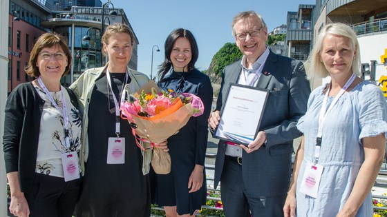 Representanter for Træna kommune sammen med statssekretær Aase Marth Horrigmo