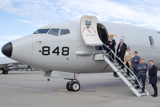 Defence delegates boarding a P8-A Poseidon at RAF Lossiemouth.