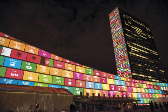 Figure 2.1 The Sustainable Development Goals projected onto the UN headquarters in New York.