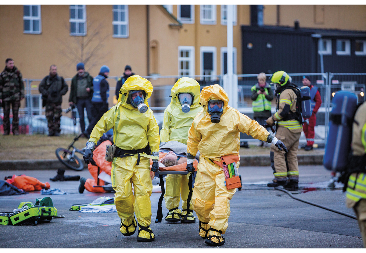 Figure 4.12 Local emergency services and the rescue service practice a nuclear incident in Norway.