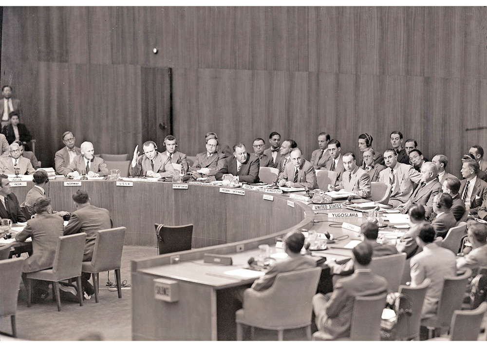 Figure 3.1 Norway's Permanent Representative to the UN, Ambassador Arne Sunde (left), participates in a UN Security Council meeting on September 6, 1950, where the Council voted on a US-initiated resolution asking all states to refrain from supporting Korean co...