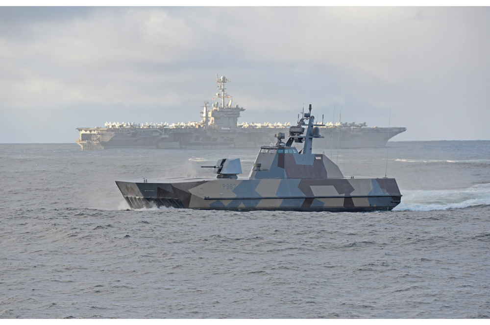 Figure 6.1 The aircraft carrier USS Harry S. Truman and the Norwegian corvette KNM Skudd during the NATO exercise Trident Juncture in October-November 2018. Norway has promoted a stronger engagement from NATO in Northern Europe, the establishment of a new comma...