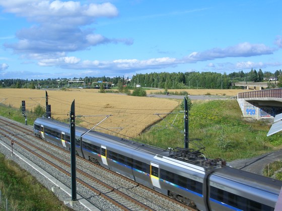 På lokaltoget gjennom Romerikslandskapet.