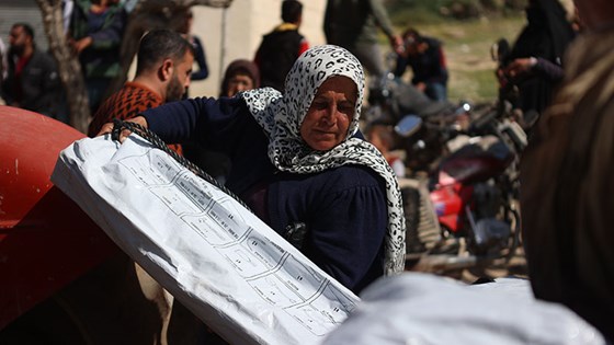 Picture of woman helping out after the earthquake